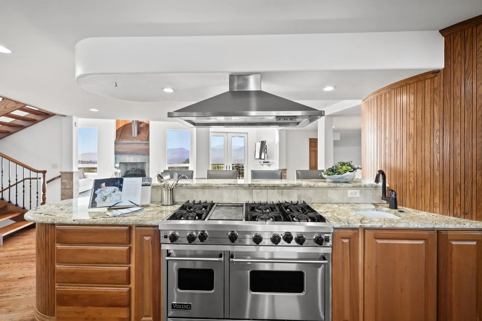 Gourmet kitchen with island and professional range